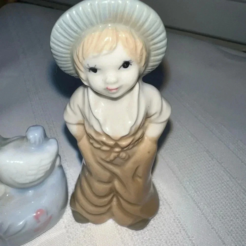 Vintage Porcelain Figurines Woman In Dress With Duck Boy Hands In Pockets